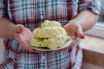 grandmother's vareniki (dumplings) with egg and green onions