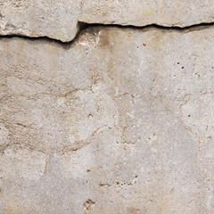 Grunge concrete cement wall with crack in industrial building, great for your design and texture background