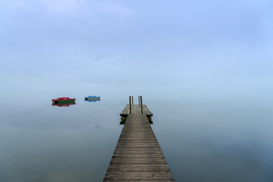 Fototapeta View of wooden pier on Kochelsee lake
