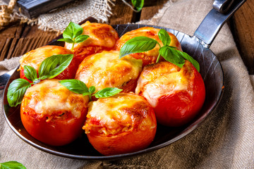 Tomatoes stuffed with rice and cheese from the oven