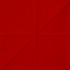 red sheet of paper folded texture