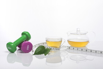 asian tea with a tape ruler isolated white.