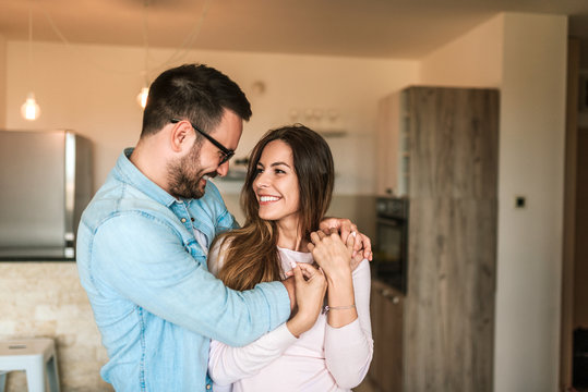 Loving young couple hugging. Close-up.