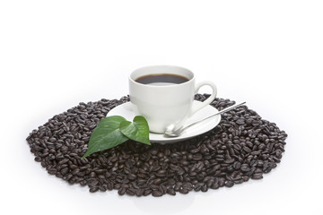 coffee cup with a leaf isolated white.