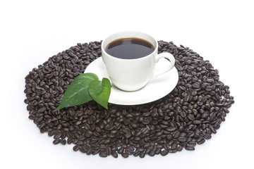 coffee cup with a leaf isolated white.