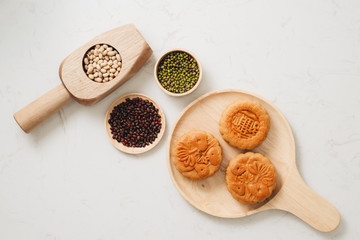 Mid-Autumn Festival still life close-up. Translation on round moon cake 