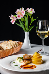 Dish at the restaurant is a roasted pike perch with caramel and white wine