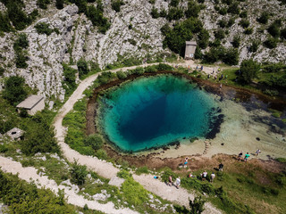 The spring of the Cetina River (izvor Cetine) in the foothills of the Dinara Mountain is named Blue...