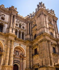 Fototapeta na wymiar Spain, Malaga, Catedral of Málaga LOW ANGLE VIEW OF HISTORIC BUILDING AGAINST SKY