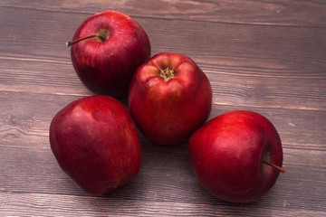 Red Apple On Wooden Background