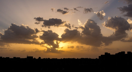 sunset in cityscape in india