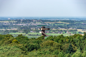 Cityscape of Aachen with observation tower and nature surrounding from above