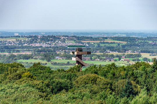 Cityscape of Aachen with observation tower and nature surrounding from above