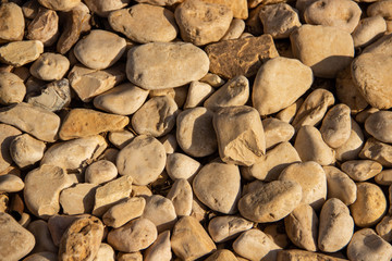 Background stones of round shape smooth sea