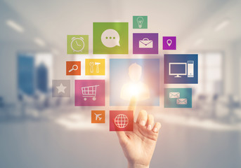 Modern office interior and close of businesswoman hand choosing 