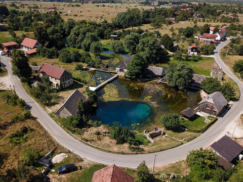 The Majer Spring / Majerjevo vrilo is one of the springs of Gacka River, Lika, Croatia. The waters that are emerging from a deep cave system are surrounded by numerous old mills. 