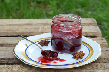 Plum jam with star anise and cinnamon. Fruit marmalade. Autumn canning and preserving. Conservation of harvest. Organic healthy vegetarian food.