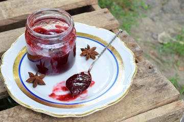 Plum jam with star anise and cinnamon. Fruit marmalade. Autumn canning and preserving. Conservation of harvest. Organic healthy vegetarian food.