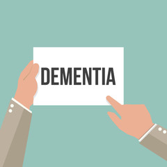 Man showing paper DEMENTIA text