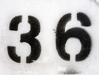Written Wording in Distressed State Typography Found Number Thirty Six 36