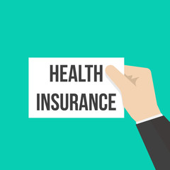 Man showing paper HEALTH INSURANCE text