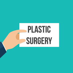 Man showing paper PLASTIC SURGERY text
