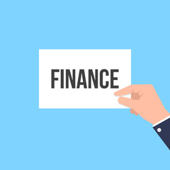 Man showing paper FINANCE text