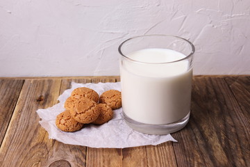 Italian biscuits amaretti with a glass of milk