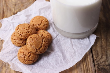 Italian biscuits amaretti with a glass of milk