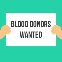 Man showing paper BLOOD DONORS WANTED