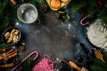 Christmas baking background with  Ingredients for cooking xmas baking, dark blue background, top view