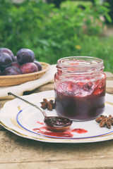 Plum jam with star anise and cinnamon. Fruit marmalade. Autumn canning and preserving. Conservation of harvest. Organic healthy vegetarian food.