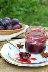 Plum jam with star anise and cinnamon. Fruit marmalade. Autumn canning and preserving. Conservation of harvest. Organic healthy vegetarian food.