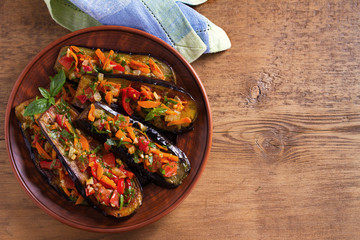 Eggplants with tomatoes, paprika, carrot, onion and garlic. Aubergine with vegetables. overhead, horizontal