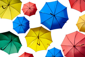 Colorful umbrellas isolated on a white background.