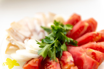 salo tomatoes parsley onion and garlic on the table