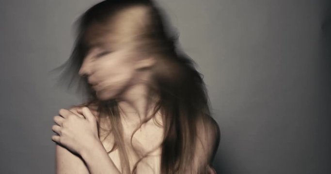 Woman with mental illness turning her head in depression concept