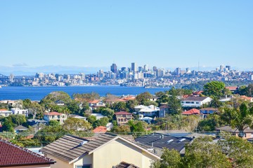 Scenic View of Residential Buildings with Sydney Skylines in the Background