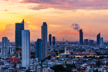 Fototapeta premium scenic of urban cityscape on sunset skyline