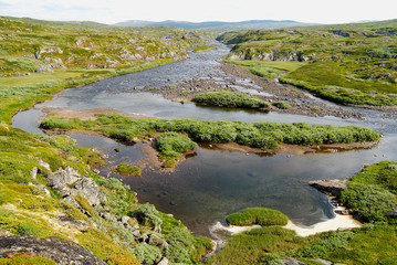 Naklejka na ściany i meble Magnificent summer landscape of the Hardangervidda mountain plateau and National park in Norway.