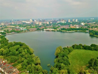 Aerial photo of a lake in a city park in Birmingham Uk