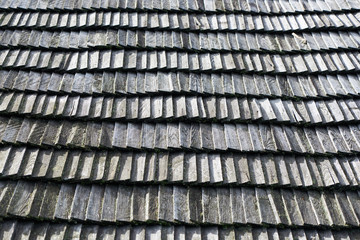 Old uneven wooden shingles, Wooden rustic roof.