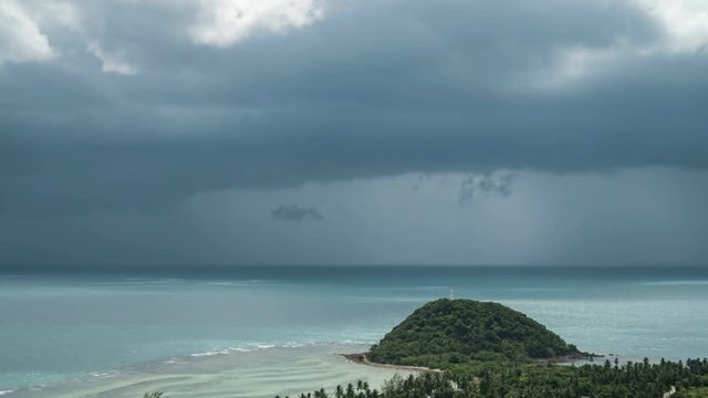 Timelapse of Tropical Island Coast with Approaching Rain Clouds