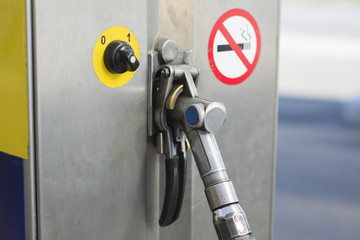 The pistol of the gas station is close-up.