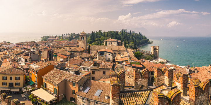 Scenic view of Sirmione town against cloudy sky
