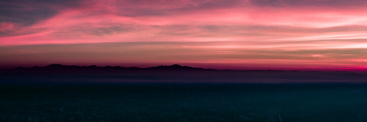 Fototapeta premium Silhouette panorama mountain and natural light sunset. In the morning, instagram style filter photo vintage tone