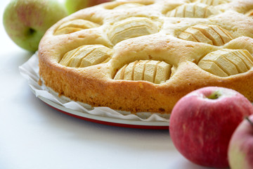 Homemade apple pie on gray wooden desk