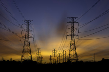 High voltage electric tower on sunset time and sky on sunset background. Power Tower