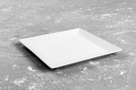 empty rectangular Plate on gray table background