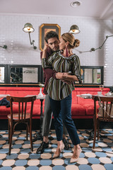 Moment of silence. Loving mature woman nestling man who holding her